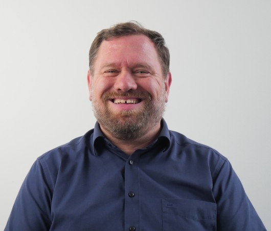 Portrait photo of our staff member Nadia Abu Rajab